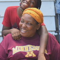 Sheronda Orridge with a Gardens for Change crew member