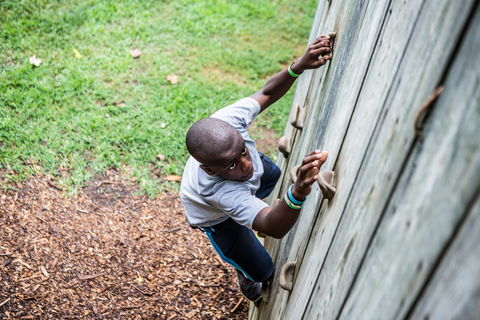 kid climbing wall