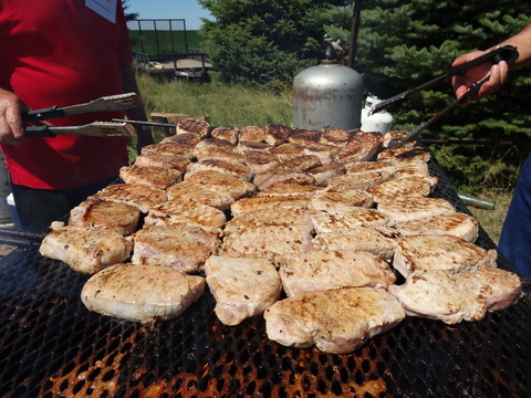 Grilling pork chops.