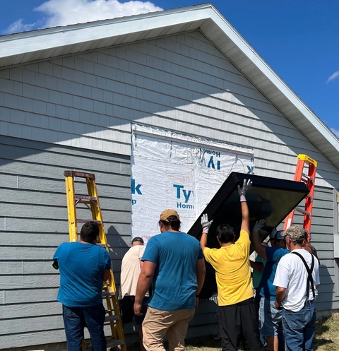 8th Fire Solar supports a group of newly trained Lower Sioux installers in putting up a solar thermal system.