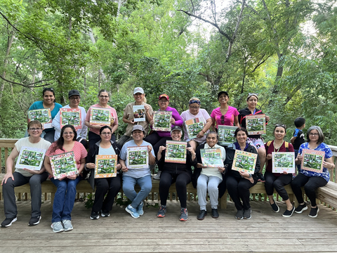 A group of participants holding certificates