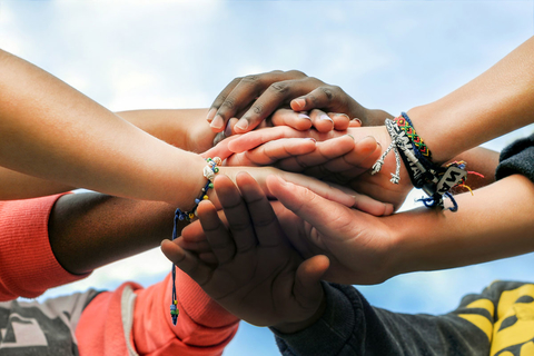 hands piled on top of each other