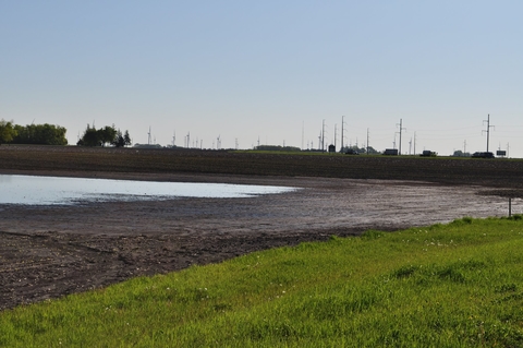 Farm field with ponded water.