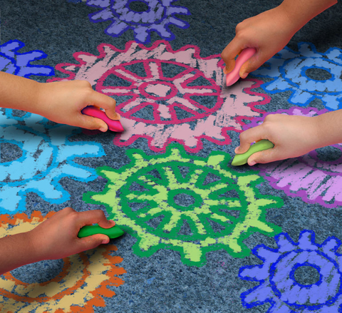 kids drawing gears with chalk