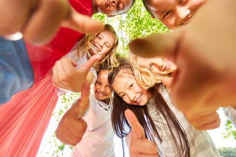 kids pointing at the camera