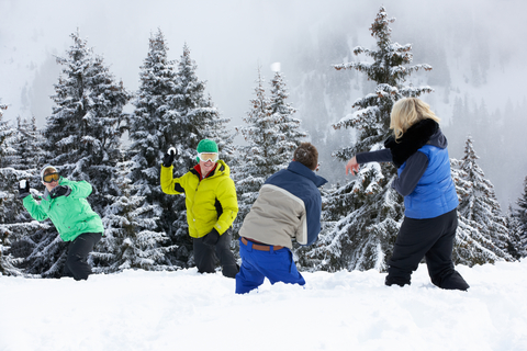 people having a snowball fight