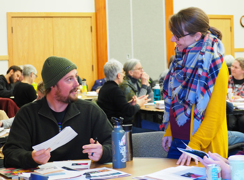 Trevor Blake talks with Extension Educator Christy Marsden at a Master Gardener class