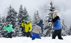 people having a snowball fight