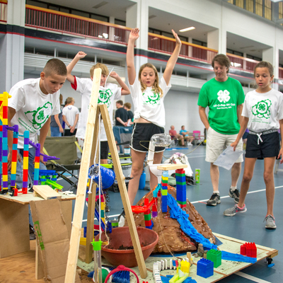 4-H team cheers because their engineering project succeeded.