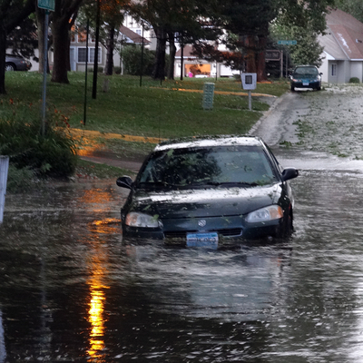 A car in a flooded street