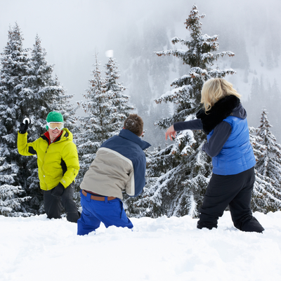 people having a snowball fight